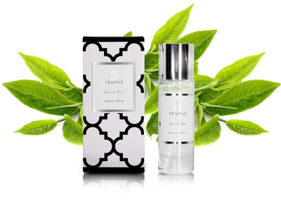 TEMPLE GREEN TEA & LEMONGRASS ROOM SPRAY combining notes of green tea leaf with the crisp scent of lemongrass, middle notes of cyclamen and mandarin peel, anchored on a base of amber and red rose.
